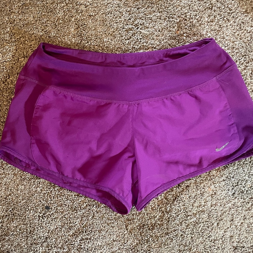 Purple Nike shorts